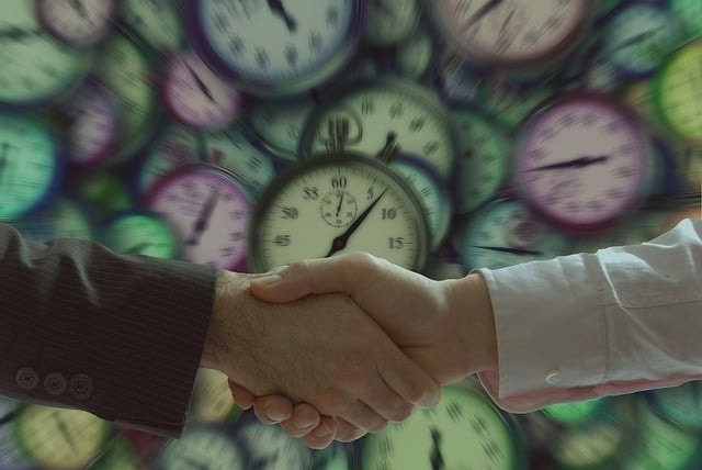 handshake, businessmen, clock